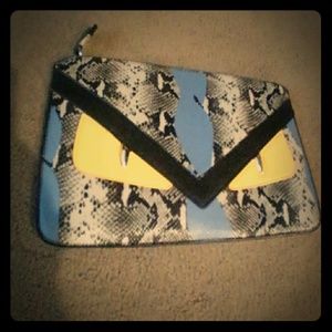 Snake skin clutch
